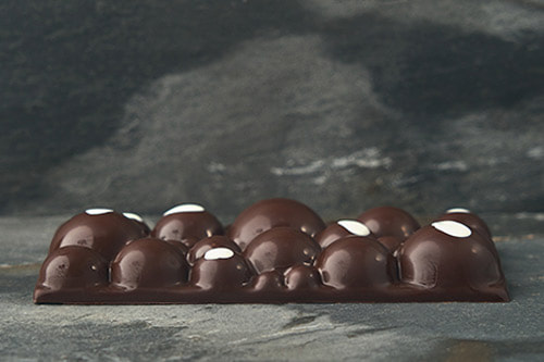 Bar with Multiple Bubbles of Salted Caramel Ganache.